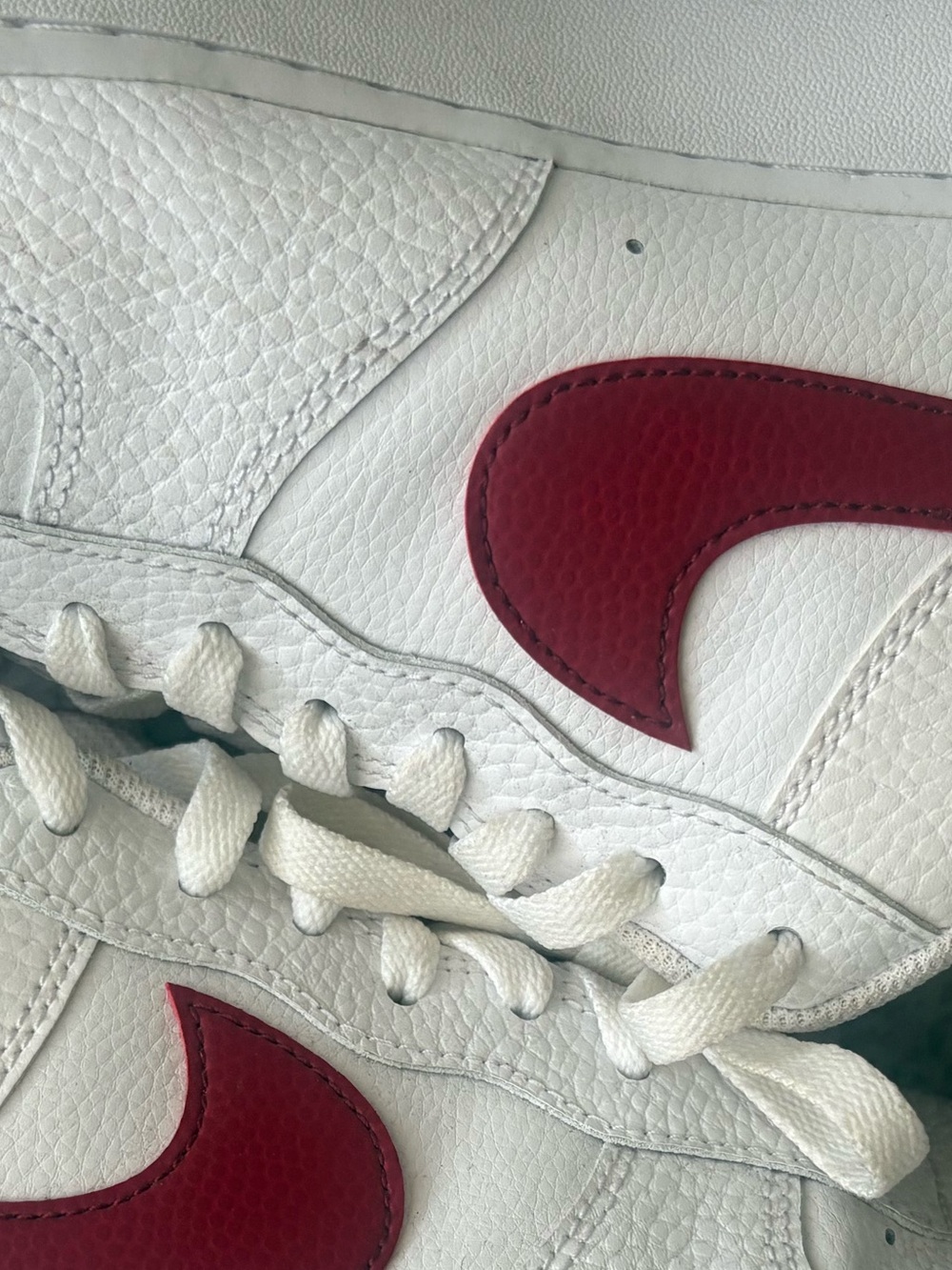 Men's White Leather Sneakers with Red Swoosh Accent